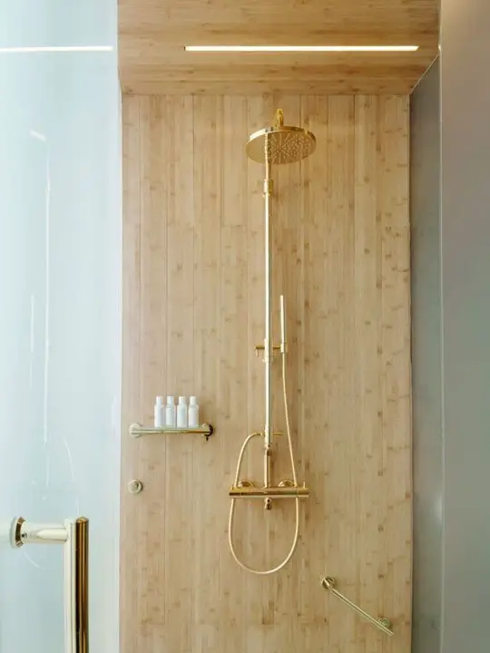 Gold and wood bathroom decor