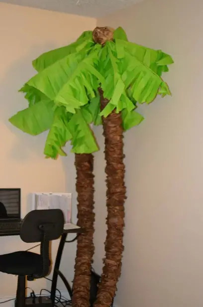 You can make your own palm trees with pool noodles