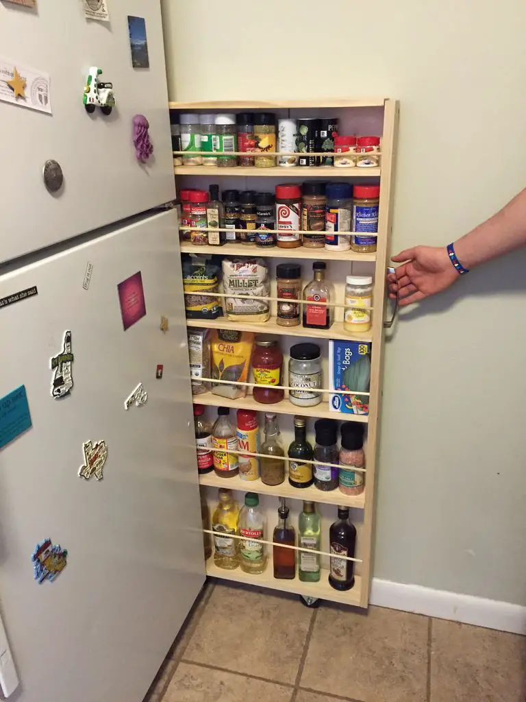 30+ Genius DIY Kitchen Storage and Organization Ideas, Hidden Fridge Gap Slide-Out Pantry